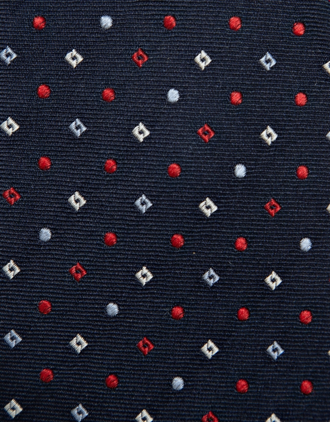 Navy silk tie with red/white geometric jacquard pattern