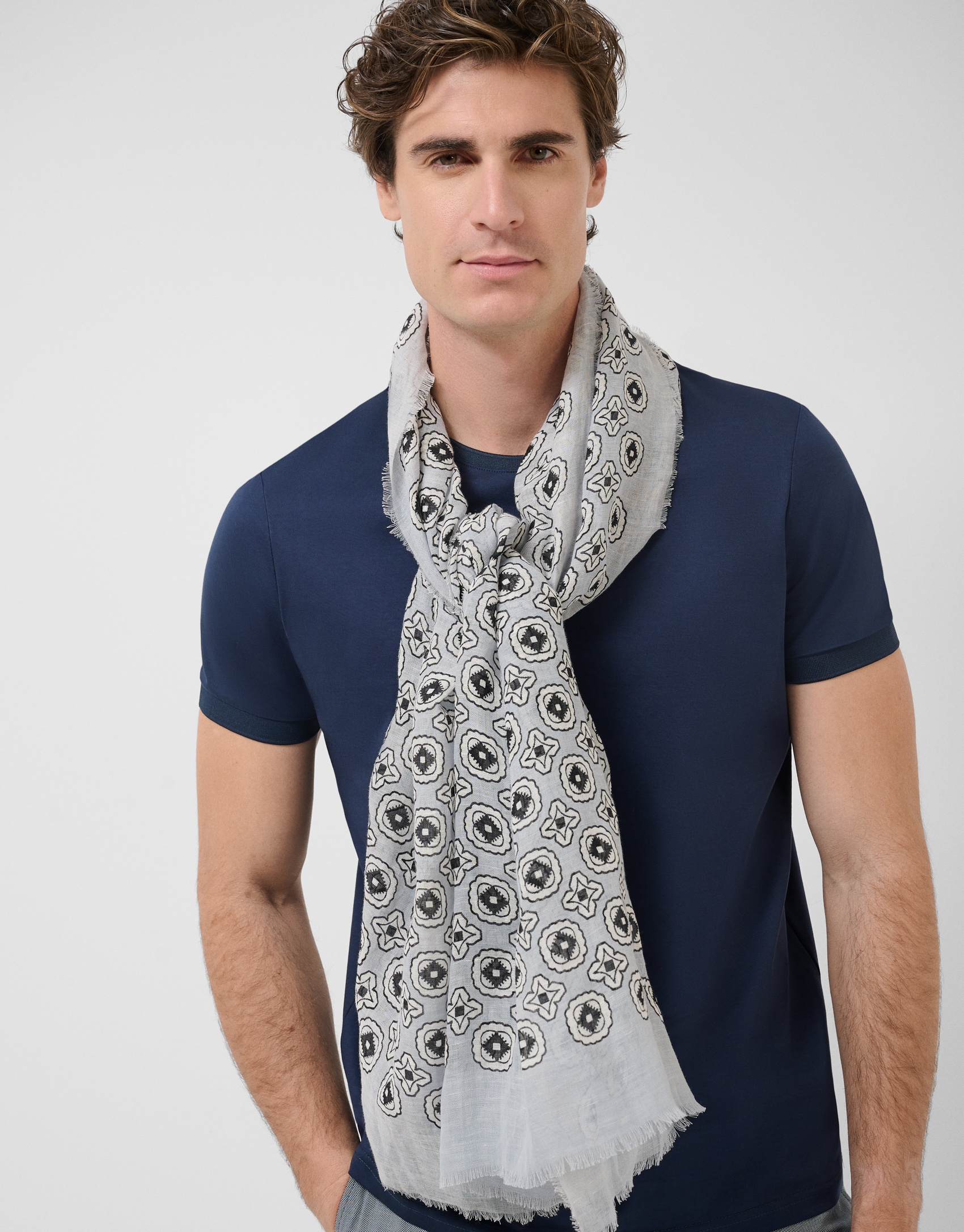 Grey scarf with blue and white geometric print