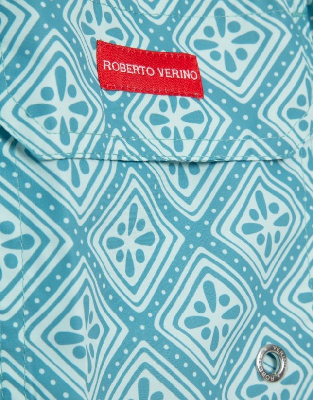 Blue-green and white geometric print swimsuit