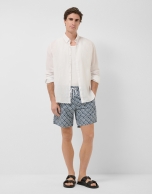 Navy blue and white geometric print swimsuit