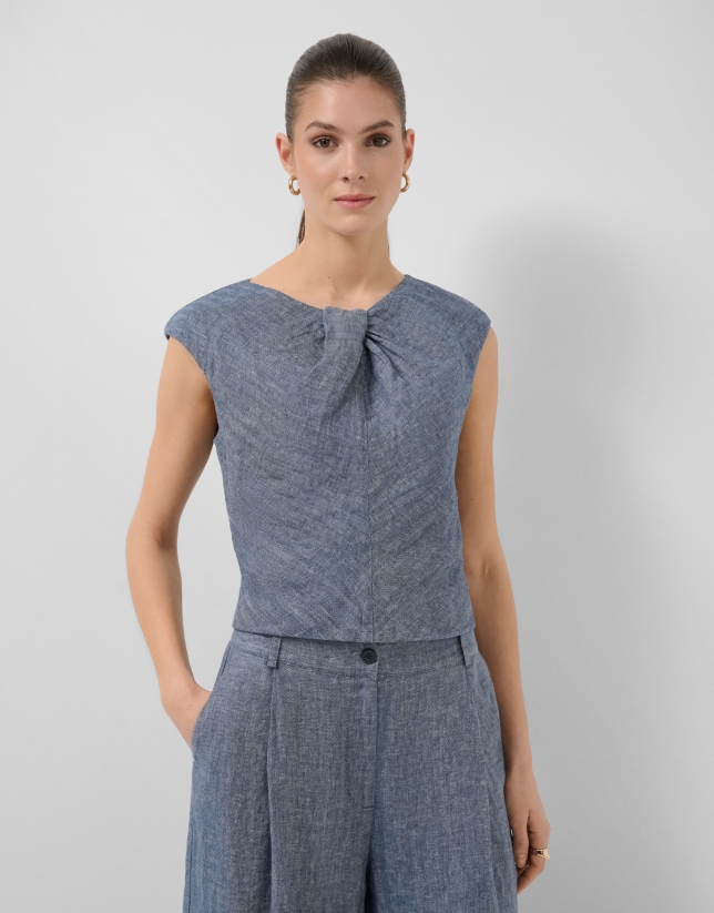 Blue linen gathered sleeveless blouse