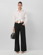 White long-sleeved knotted shirt