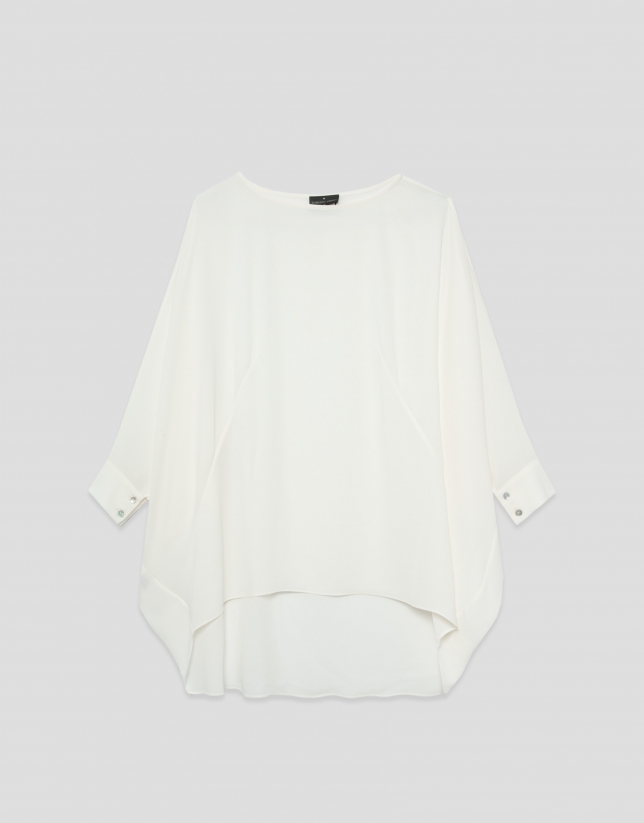 Long, flowing ecru blouse