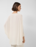 Long, flowing ecru blouse
