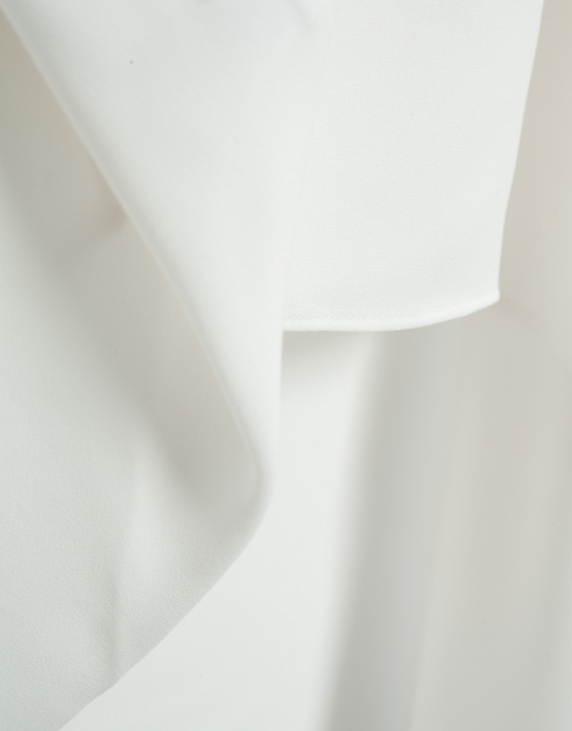 Long, flowing ecru blouse