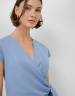 Blue sleeveless wrap midi dress