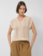 Beige vest-style top with textured knit